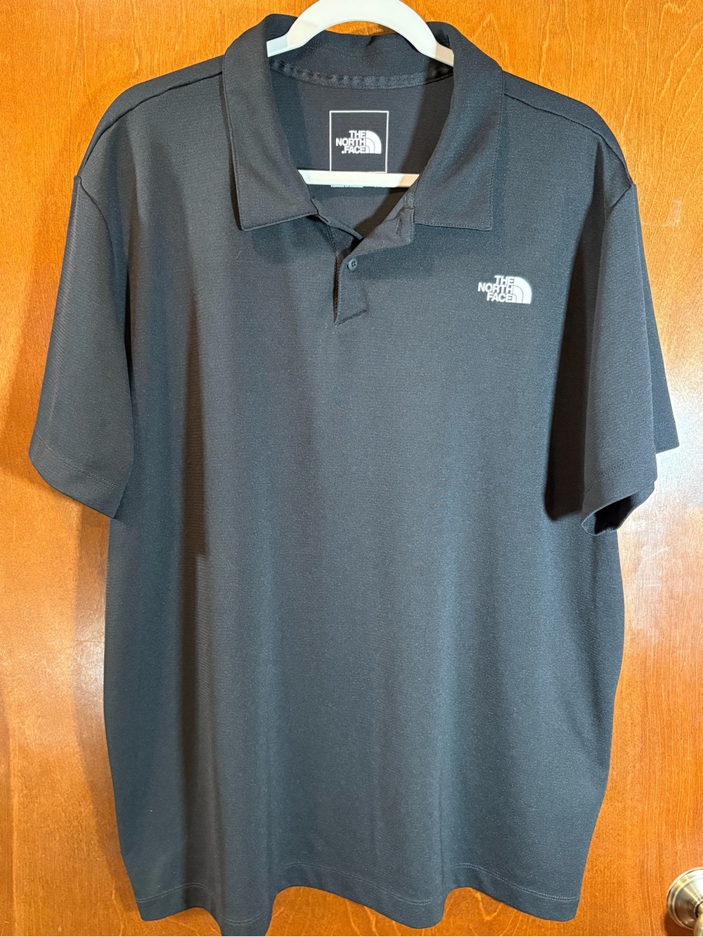 The North Face Black Men’s Polo Shirt with White Logo